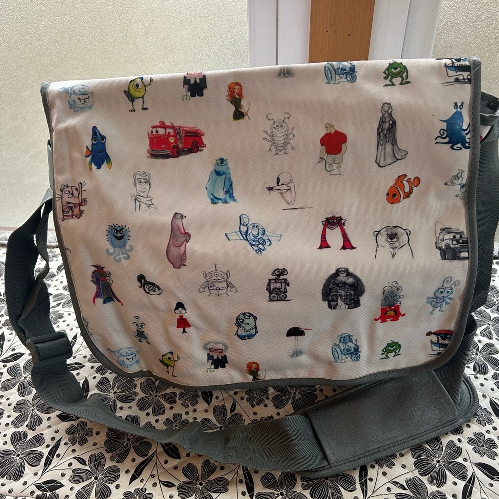 NWOT Disney Pixar Character Sketch Print Messenger Bag